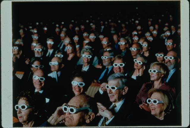 [Scene of audience wearing 3D glasses for the production of "Monsters of Grace" during BAM Next Wave Festival, 1998]