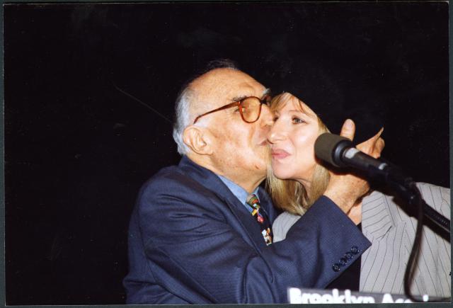 [Harvey Lichtenstein kisses Barbra Streisand, circa 1988]