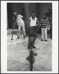 [Tunji Oyelana, Femi Elufowoju, and Wale Ogunyemi in a scene from the Jude Kelly production "The Beatification of Area Boy: A Lagosian Kaleidoscope" during BAM Next Wave Festival, 1996]