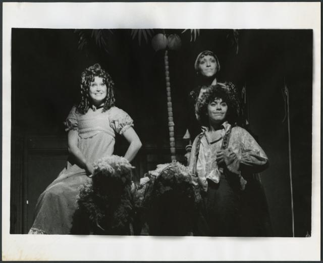 [Deborah St. Darr as Pacquet, June Gable as the Old Woman, and Mark Baker as Candide in the Chelsea Theater Center production of "Candide" during BAM Fall Series, 1973]