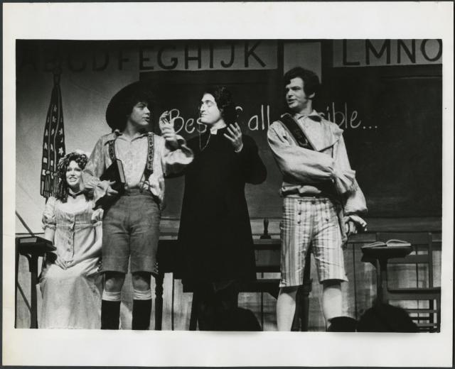 [Deborah St. Darr as Paquette, Mark Baker as Candide, Lewis J. Stadlen as Dr. Pangloss, and Sam Freed as Maximillian in the Chelsea Theater Center production of "Candide" during BAM Fall Series, 1973]