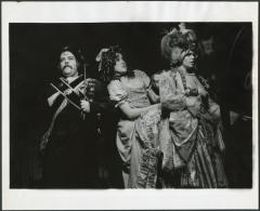 [Joe Palmieri as the Baron, Deborah St. Darr as Paquette, and Mary-Pat Green as the Baroness in the Chelsea Theater Center production of "Candide" during BAM Fall Series, 1973]