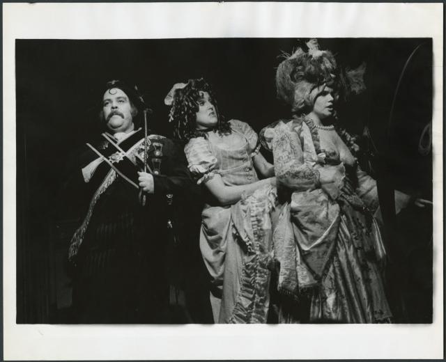 [Joe Palmieri as the Baron, Deborah St. Darr as Paquette, and Mary-Pat Green as the Baroness in the Chelsea Theater Center production of "Candide" during BAM Fall Series, 1973]