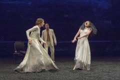 [Ellen Lauren, Barney O'Hanlon, and Akiko Aizawa in The SITI Company production of "Trojan Women (After Euripides)" during the BAM Next Wave Festival, 2012]