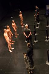 [Wilmer Wilson IV, Lawrence Graham-Brown, Rocheford Belizaire, and Clifford Owens (all nude) with dog handlers in a scene from the Dread Scott production "Decision" part of "Brooklyn Bred" during the BAM Next Wave Festival, 2012]