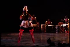 [Scene from "DanceAfrica: African Roots in American Soil: Male Rites of Passage" during BAM Spring Season, 1998]